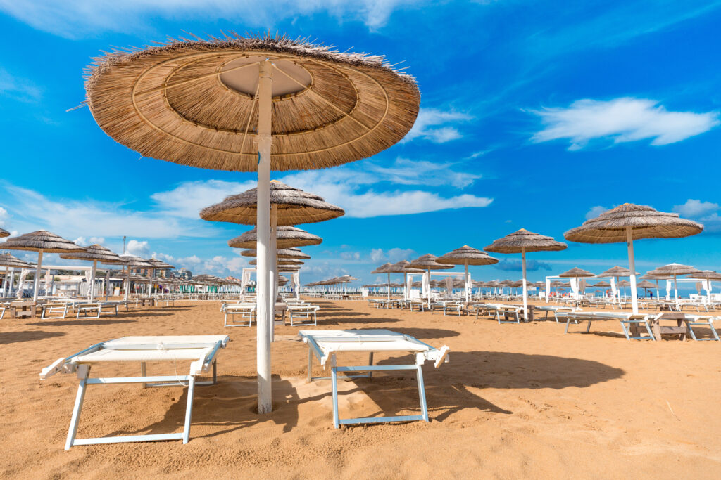 Large beach with sun beds on the Coast of Emilia-Romagna in Rimini