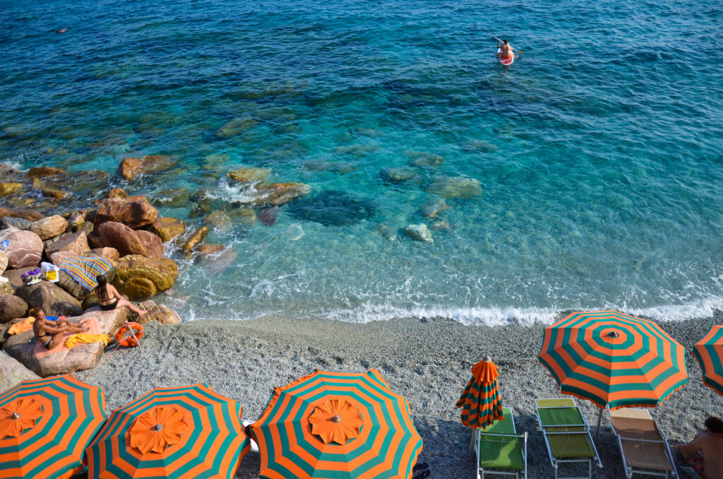 Vacation in Italy on the beach of Monterosso al Mare, one of the five Cinque Terre villages