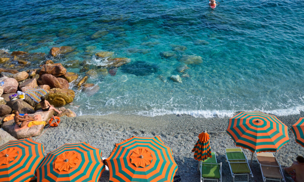 Vacation in Italy on the beach of Monterosso al Mare, one of the five Cinque Terre villages