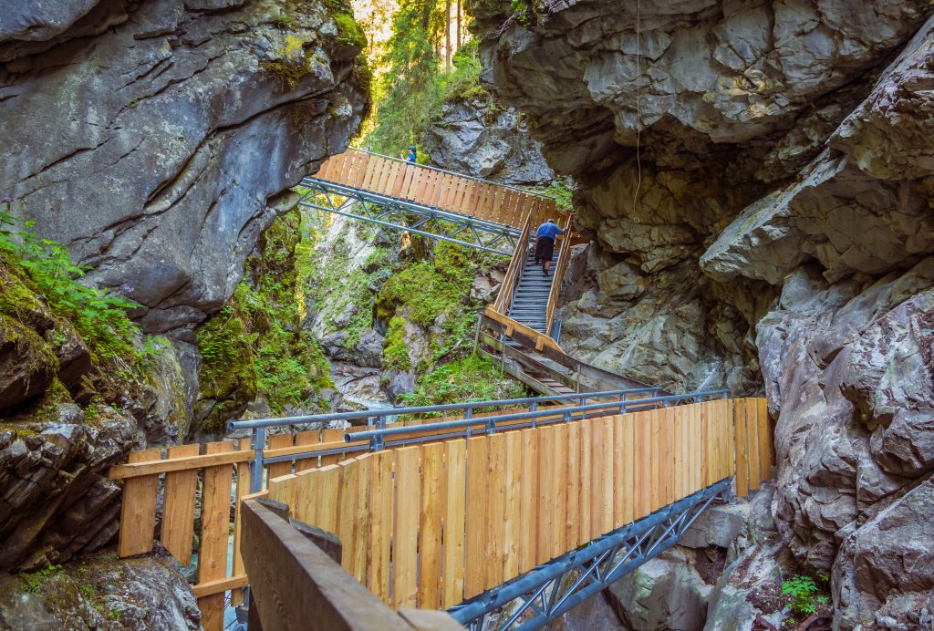 Wooden bridges and runways in Racines, Bolzano, lead through the canyon and give a spectacular sight to the waterfalls